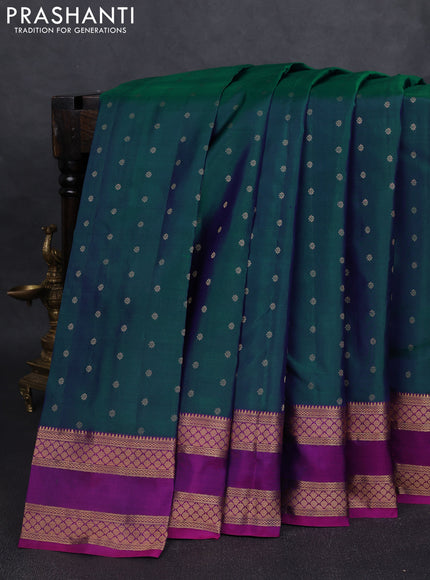 Pure kanchipuram silk saree dual tone peacock green and purple with allover zari woven 1000 buttas and rettapet zari woven border