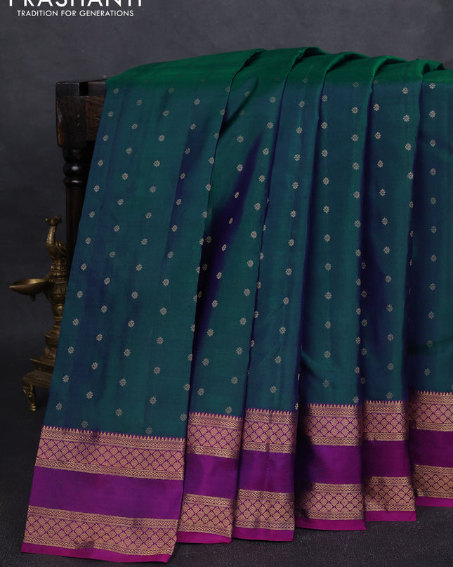 Pure kanchipuram silk saree dual tone peacock green and purple with allover zari woven 1000 buttas and rettapet zari woven border