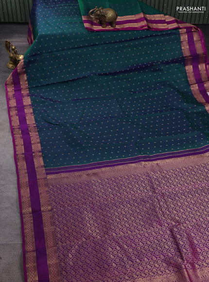 Pure kanchipuram silk saree dual tone peacock green and purple with allover zari woven 1000 buttas and rettapet zari woven border