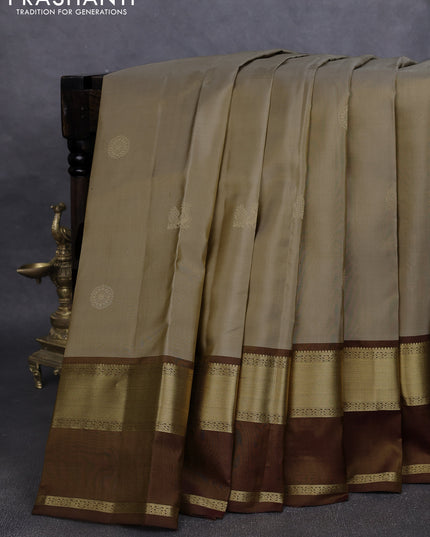 Pure kanchipuram silk saree elaichi green and brown with zari woven buttas and rettapet zari woven border