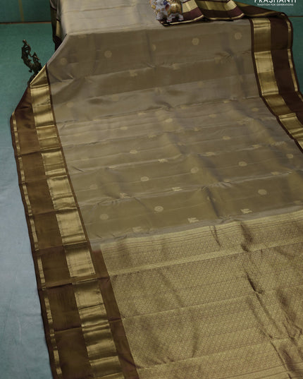 Pure kanchipuram silk saree elaichi green and brown with zari woven buttas and rettapet zari woven border