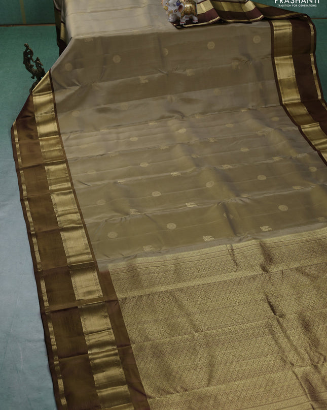 Pure kanchipuram silk saree elaichi green and brown with zari woven buttas and rettapet zari woven border