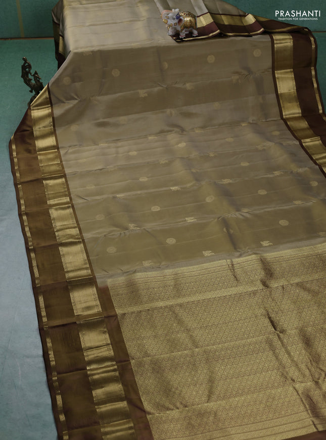 Pure kanchipuram silk saree elaichi green and brown with zari woven buttas and rettapet zari woven border