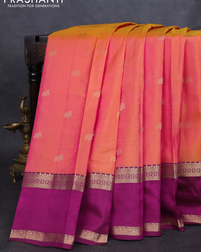 Pure kanchipuram silk saree dual shade of yellowish pink and dark magenta pink with zari woven buttas and rettapet zari woven border