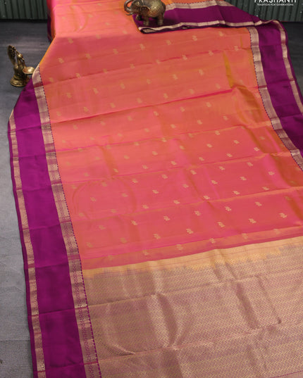 Pure kanchipuram silk saree dual shade of yellowish pink and dark magenta pink with zari woven buttas and rettapet zari woven border