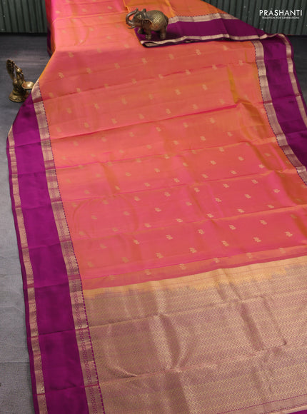 Pure kanchipuram silk saree dual shade of yellowish pink and dark magenta pink with zari woven buttas and rettapet zari woven border
