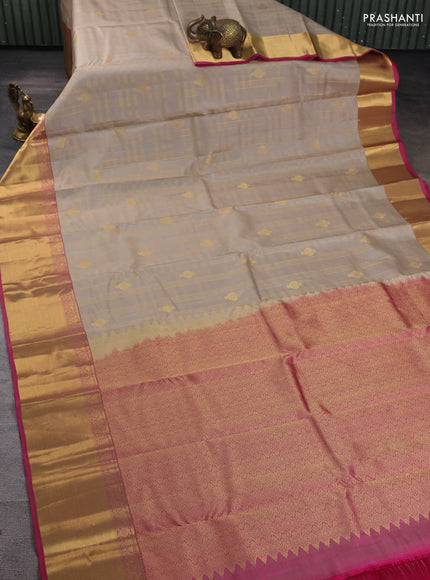Pure kanchipuram silk saree beige and pink with allover zari checks & buttas and rich zari woven border