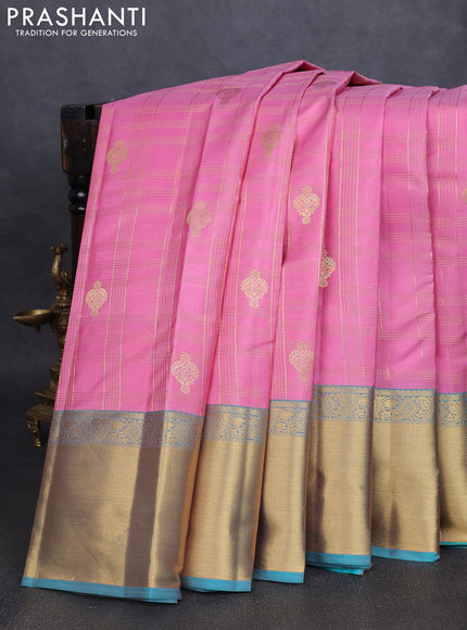 Pure kanchipuram silk saree light pink and teal blue with allover zari checks & buttas and rich zari woven border