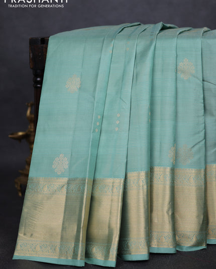 Pure kanchipuram silk saree pastel green and dark magenta pink with allover vairaosi pattern & zari buttas and long rich zari woven border
