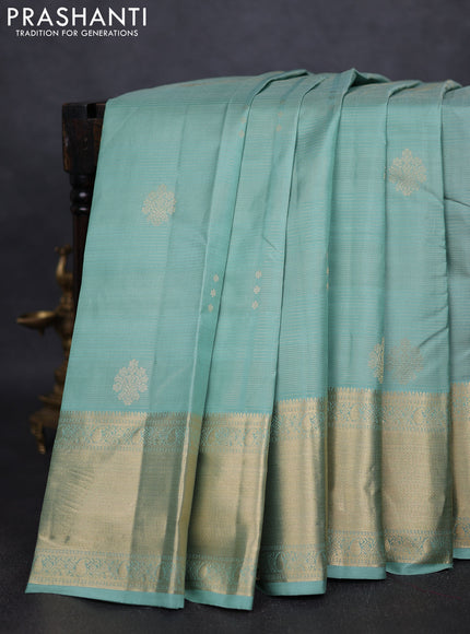 Pure kanchipuram silk saree pastel green and dark magenta pink with allover vairaosi pattern & zari buttas and long rich zari woven border