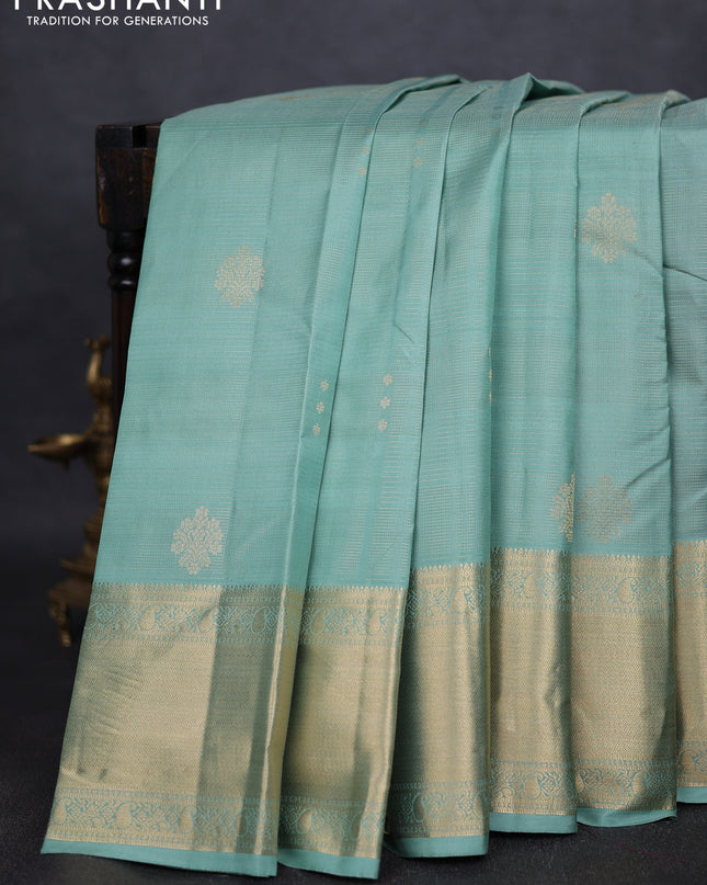 Pure kanchipuram silk saree pastel green and dark magenta pink with allover vairaosi pattern & zari buttas and long rich zari woven border