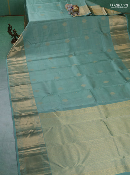 Pure kanchipuram silk saree pastel green and dark magenta pink with allover vairaosi pattern & zari buttas and long rich zari woven border