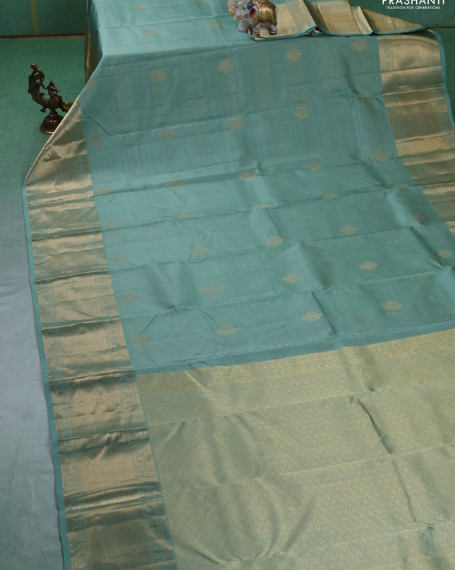 Pure kanchipuram silk saree pastel green and dark magenta pink with allover vairaosi pattern & zari buttas and long rich zari woven border