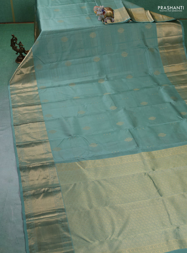 Pure kanchipuram silk saree pastel green and dark magenta pink with allover vairaosi pattern & zari buttas and long rich zari woven border