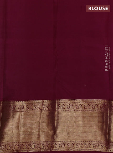 Pure kanchipuram silk saree pastel green and dark magenta pink with allover vairaosi pattern & zari buttas and long rich zari woven border