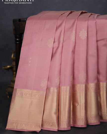 Pure kanchipuram silk saree pastel peach and bottle green with allover vairaosi pattern & zari buttas and long rich zari woven border