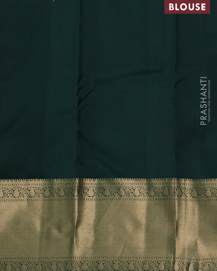 Pure kanchipuram silk saree pastel peach and bottle green with allover vairaosi pattern & zari buttas and long rich zari woven border