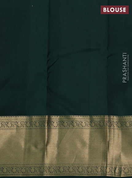 Pure kanchipuram silk saree pastel peach and bottle green with allover vairaosi pattern & zari buttas and long rich zari woven border