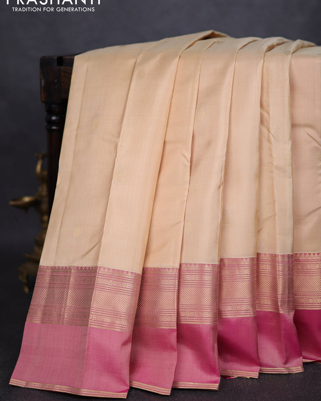 Pure kanchipuram silk saree cream and dual tone pink with zari woven buttas and ganga jamuna border