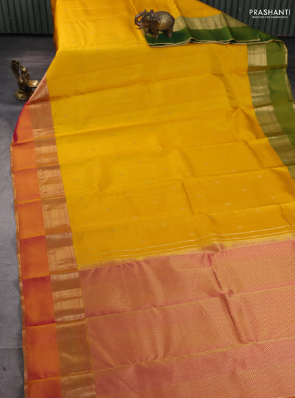 Pure kanchipuram silk saree mango yellow and dual tone pink with zari woven buttas and ganga jamuna border