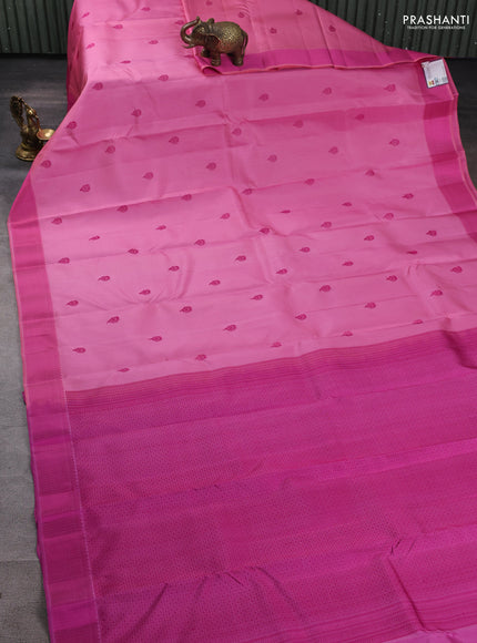 Pure kanchipuram silk saree light pink and pink with thread woven buttas and thread woven border