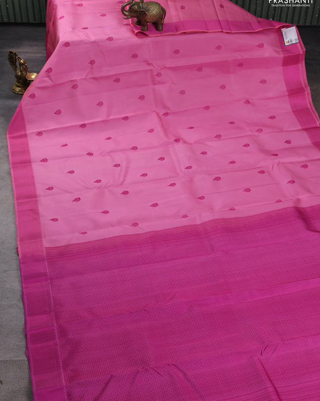 Pure kanchipuram silk saree light pink and pink with thread woven buttas and thread woven border