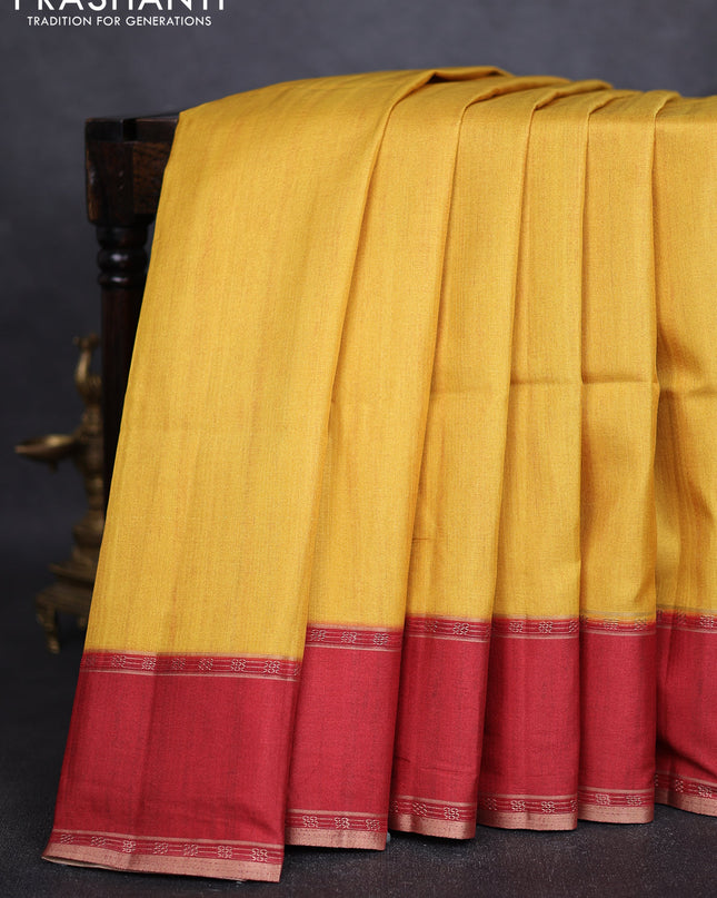 Art tussar saree yellow and maroon with plain body and rettapet zari woven border
