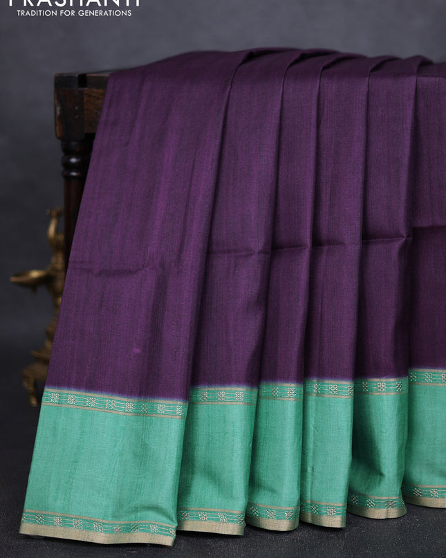 Art tussar saree deep jamun and teal green with plain body and rettapet zari woven border