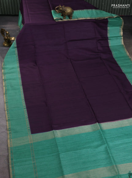 Art tussar saree deep jamun and teal green with plain body and rettapet zari woven border