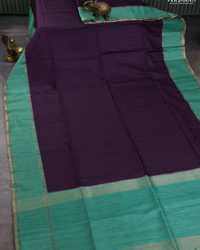 Art tussar saree deep jamun and teal green with plain body and rettapet zari woven border