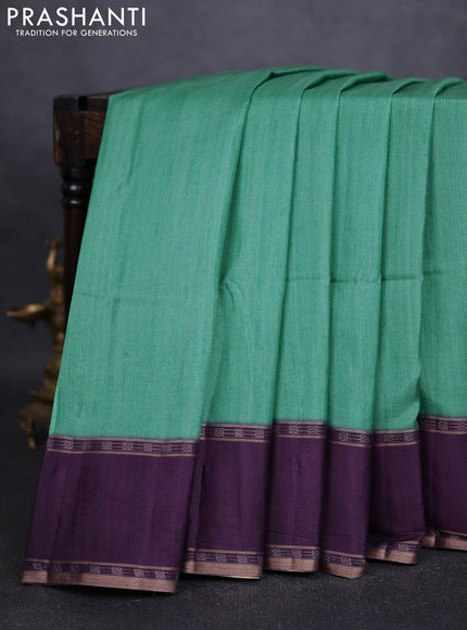 Art tussar saree teal green and deep purple with plain body and rettapet zari woven border