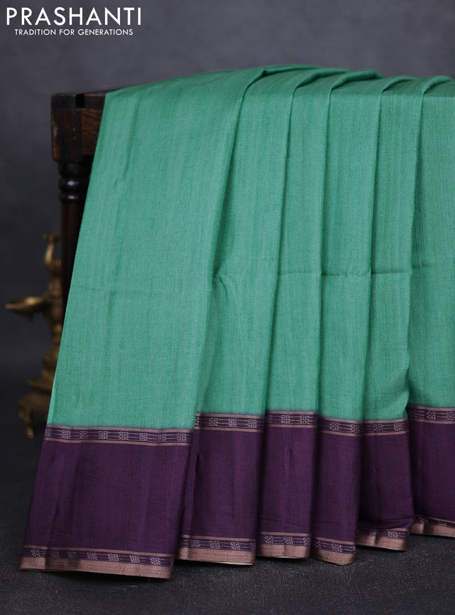 Art tussar saree teal green and deep purple with plain body and rettapet zari woven border
