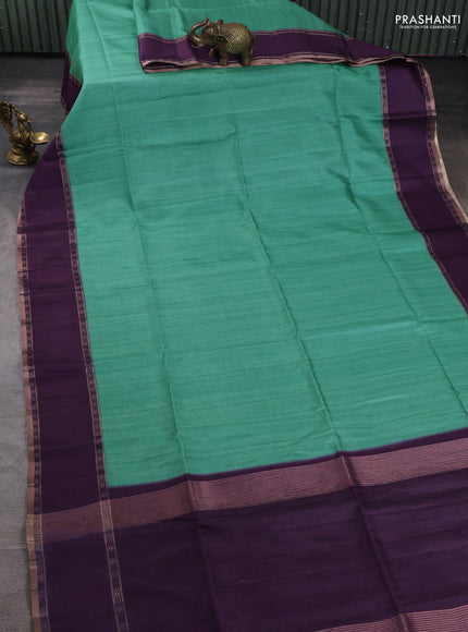 Art tussar saree teal green and deep purple with plain body and rettapet zari woven border