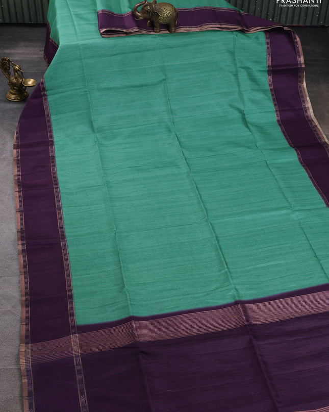 Art tussar saree teal green and deep purple with plain body and rettapet zari woven border