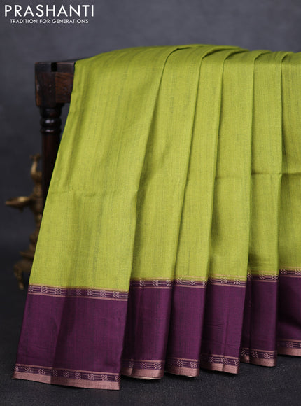 Art tussar saree light green and deep purple with plain body and rettapet zari woven border