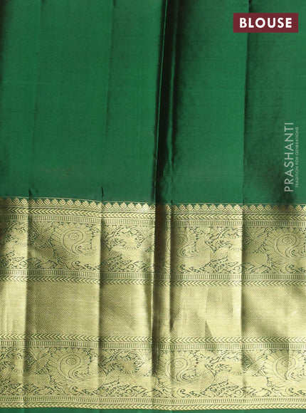 Pure kanchipuram unstitched silk  lehenga green with allover silver zari woven brocade weaves and long annam zari woven border
