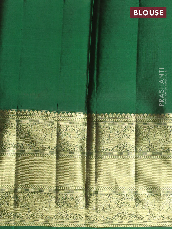 Pure kanchipuram unstitched silk  lehenga green with allover silver zari woven brocade weaves and long annam zari woven border