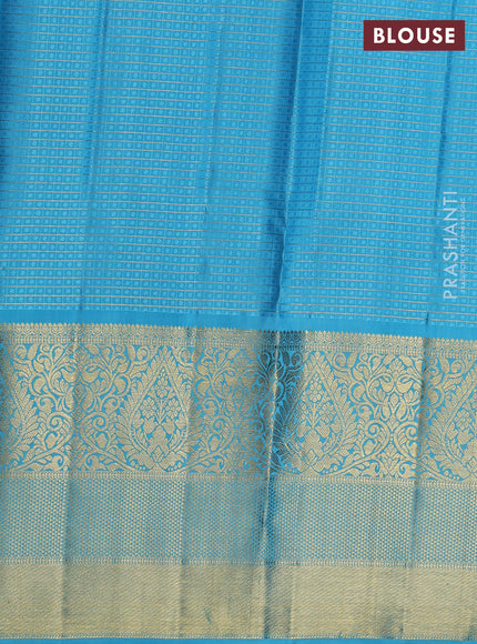 Pure kanchipuram unstitched silk  wine shade and light blue with allover zari checks & buttas and long zari woven border
