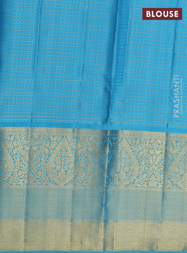 Pure kanchipuram unstitched silk  wine shade and light blue with allover zari checks & buttas and long zari woven border