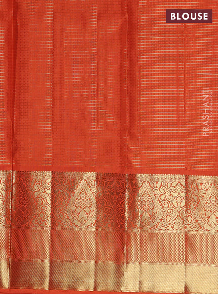 Pure kanchipuram unstitched silk  lehenga purple and orange with allover zari checks & buttas and long zari woven border