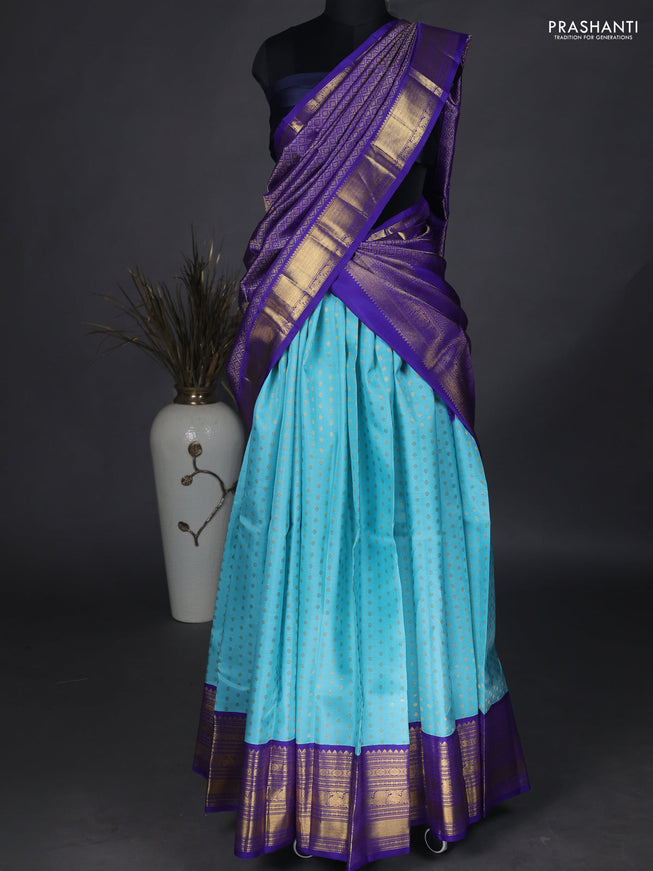 Pure kanchipuram unstitched silk lehenga light blue and blue with allover zari woven buttas and zari woven border
