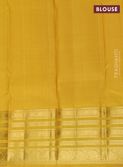 Pure kanchipuram unstitched silk lehenga pink and mustard yellow with allover zari weaves and zari woven border