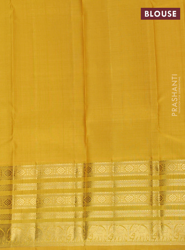 Pure kanchipuram unstitched silk lehenga pink and mustard yellow with allover zari weaves and zari woven border