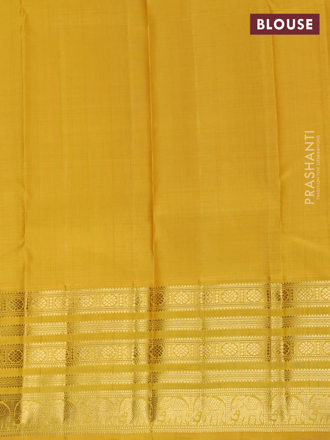 Pure kanchipuram unstitched silk lehenga pink and mustard yellow with allover zari weaves and zari woven border