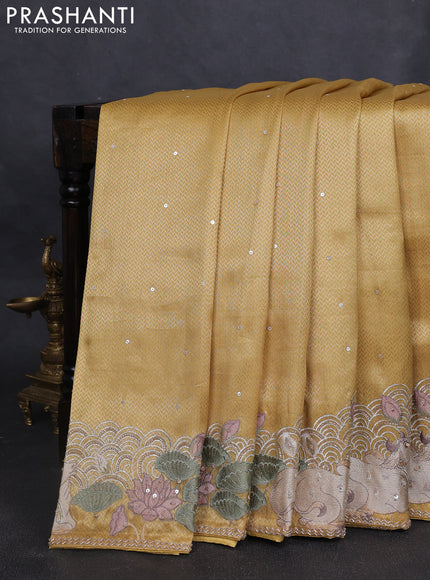 Banarasi silk saree yellow with allover zari weaves & sequin work and embroidery border