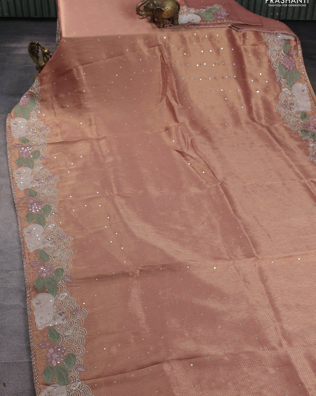 Banarasi silk saree peach shade with allover zari weaves & sequin work and embroidery border