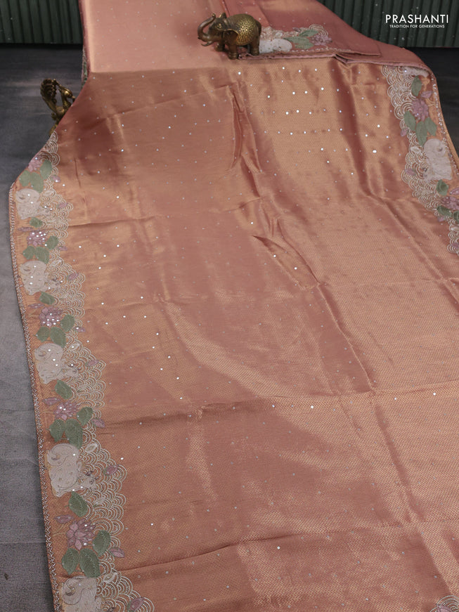 Banarasi silk saree peach shade with allover zari weaves & sequin work and embroidery border
