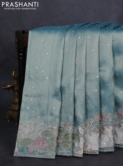 Banarasi silk saree teal blue shade with allover zari weaves & sequin work and embroidery border