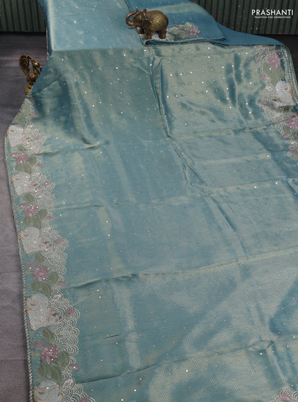 Banarasi silk saree teal blue shade with allover zari weaves & sequin work and embroidery border