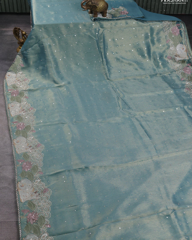 Banarasi silk saree teal blue shade with allover zari weaves & sequin work and embroidery border